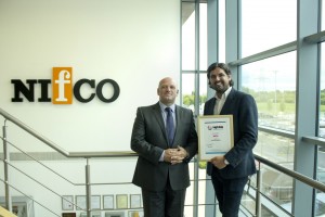 Trustee Mark Easby of Better Brand Agency presenting Mik eMatthews of Nifco with certificate